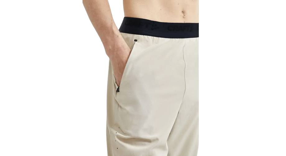 Штани Craft ADV ESSENCE PERFORATED PANTS чоловічі, розмір XS, сезон SS 21, бежевий 3