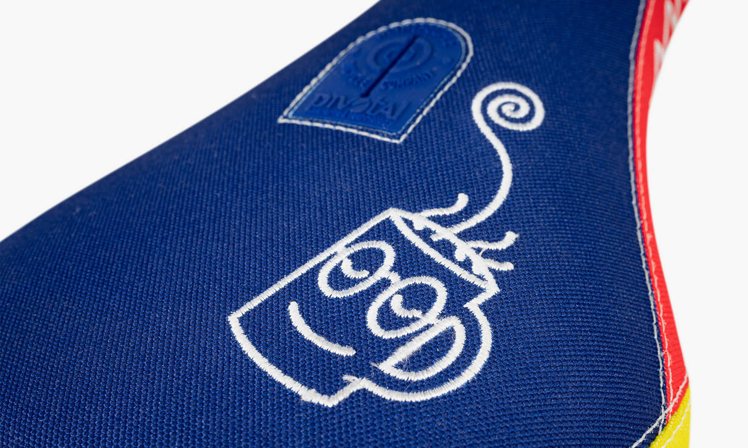 Сідло WeThePeople TEAM PIVOTAL fat padded Синє/червоне/жовте SIGNATURE 5 Сідло WeThePeople TEAM PIVOTAL fat padded Синє/червоне/жовте SIGNATURE 5